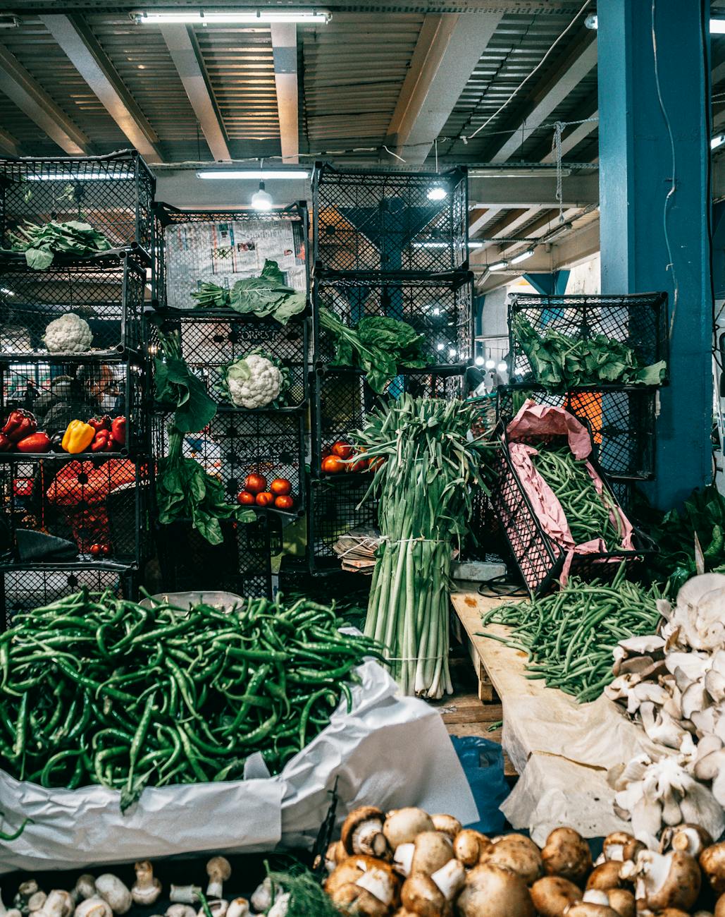 assorted vegetables kept in boxes in market warehouse